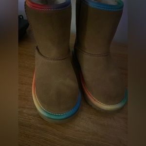 Classic short rainbow Ugg boot for toddlers size 11.